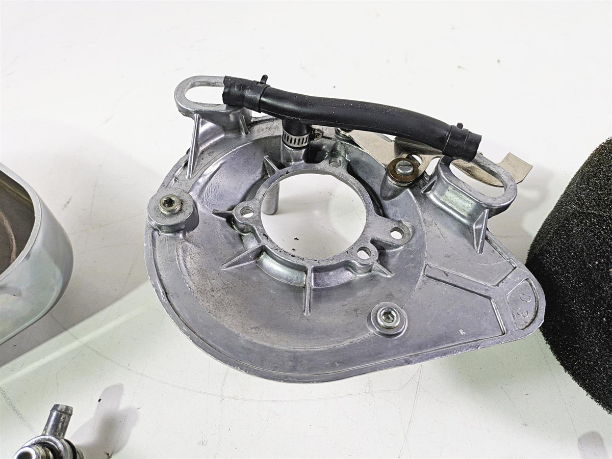 Used aluminum motorcycle engine cover with attached hose, available at Mototech271