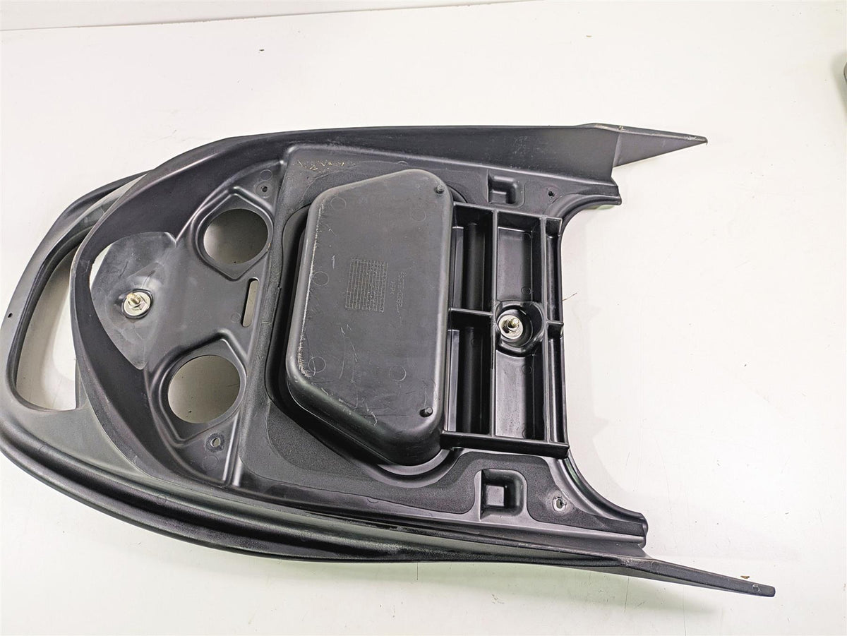 Used black motorcycle seat base plastic with mounting points, available at Mototech271