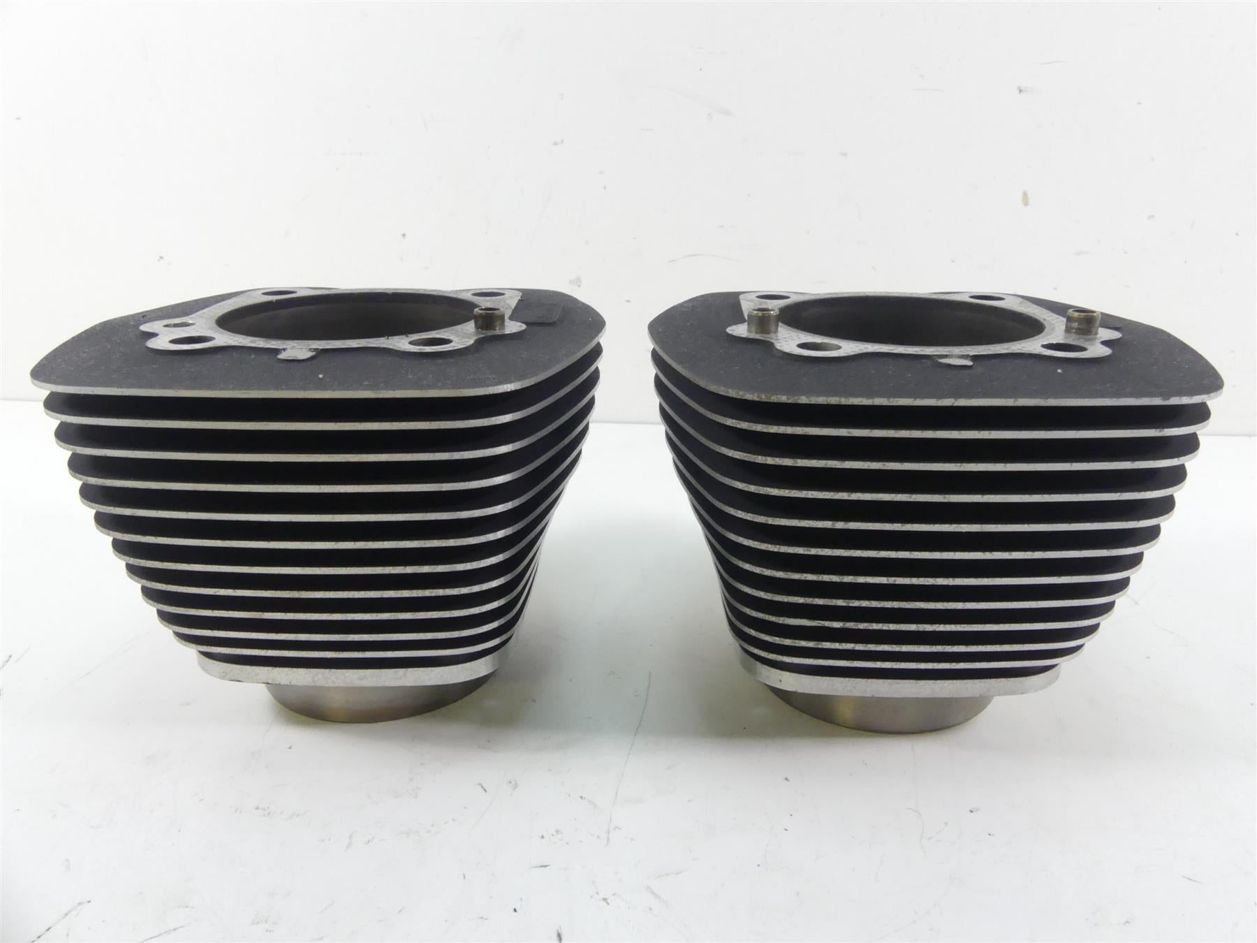 Pair of used motorcycle engine cylinder barrels with cooling fins, available at Mototech271