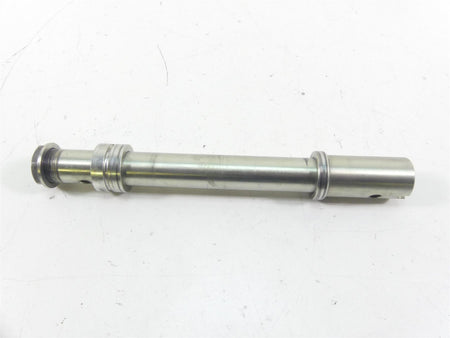 Used motorcycle axle shaft, clean metal part on white background, available at Mototech271
