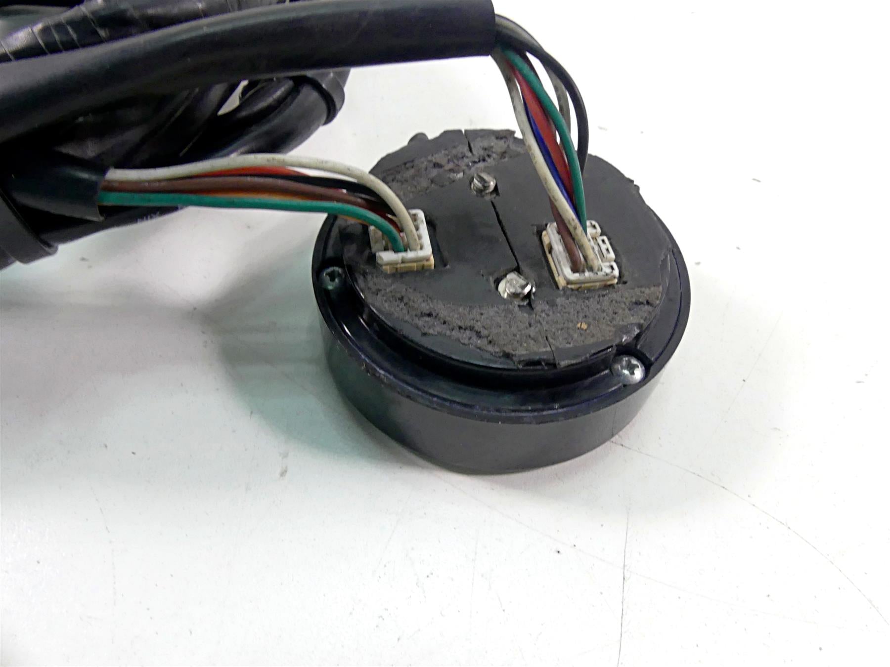 Used motorcycle speedometer back with exposed wires and connectors available at Mototech271