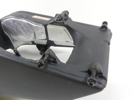 Used motorcycle swingarm part with bolts and heat shield, available at Mototech271