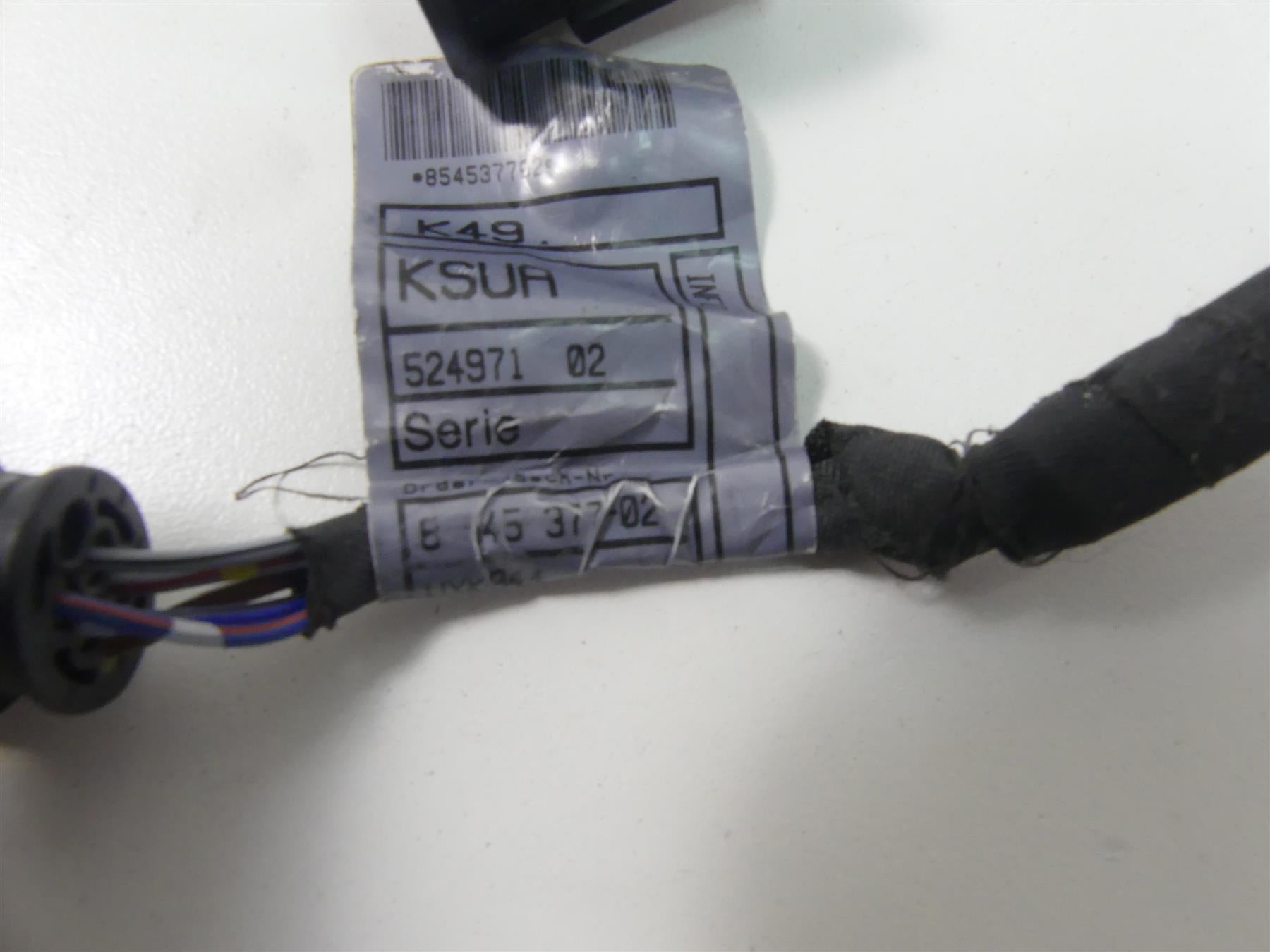 Used motorcycle wiring harness with label and connector, available at Mototech271