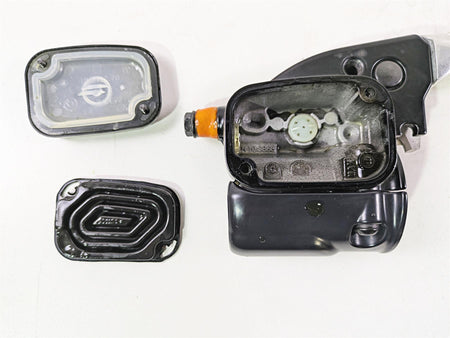 Used motorcycle brake master cylinder reservoir parts on white background, available at Mototech271