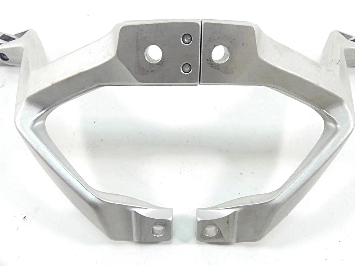 Silver motorcycle rear grab bar bracket with mounting holes on white background, available at Mototech271