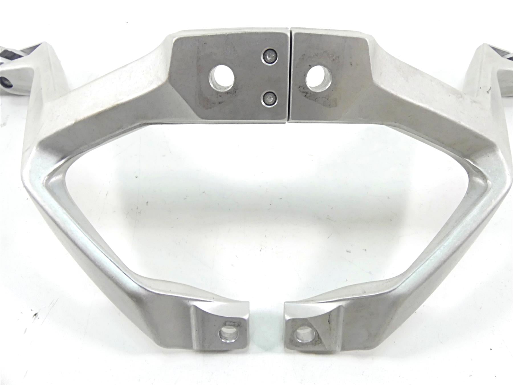 Silver motorcycle rear grab bar bracket with mounting holes on white background, available at Mototech271