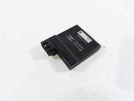 Used black motorcycle ECU control module on white background, available at Mototech271