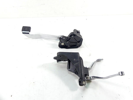 Used motorcycle foot controls with metal levers and black mounts, available at Mototech271