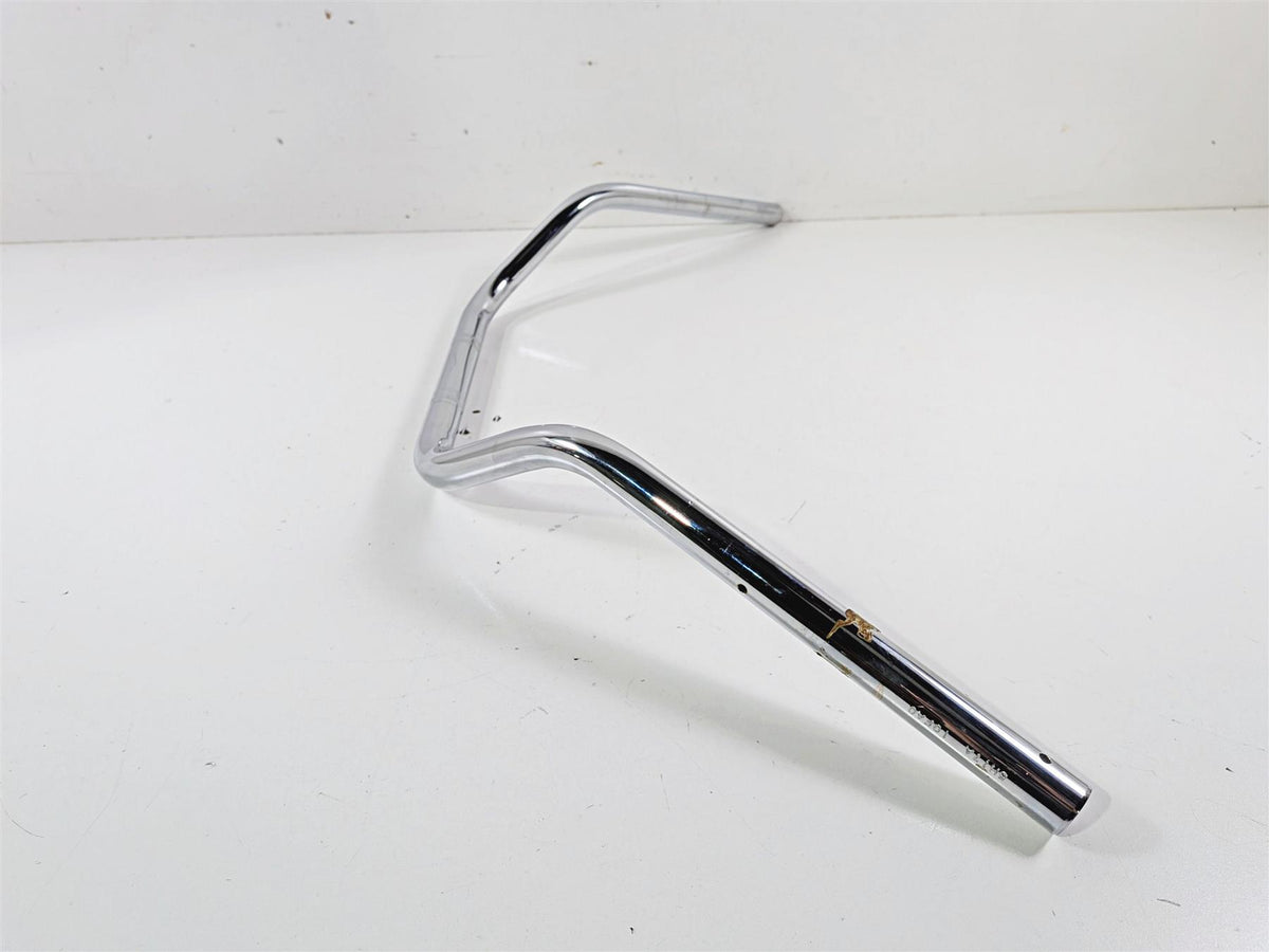 Chrome motorcycle handlebar with slight surface wear, available at Mototech271