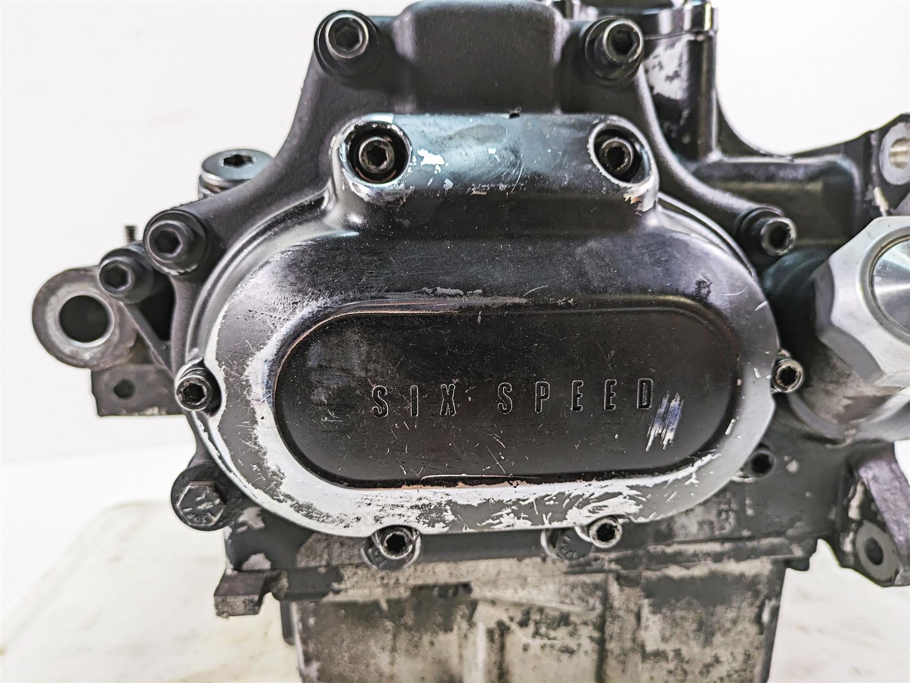 Used six speed motorcycle engine side cover with bolts, available at Mototech271