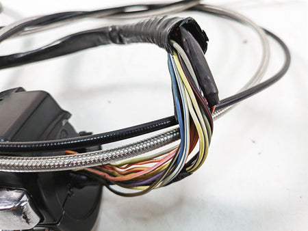 Close-up of used motorcycle handlebar wiring harness with exposed colored wires, available at Mototech271