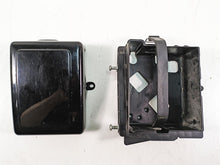 Load image into Gallery viewer, 2012 Harley FLD Dyna Switchback Battery Tray Carrier Stay &amp; Cover 70379-06B | Mototech271
