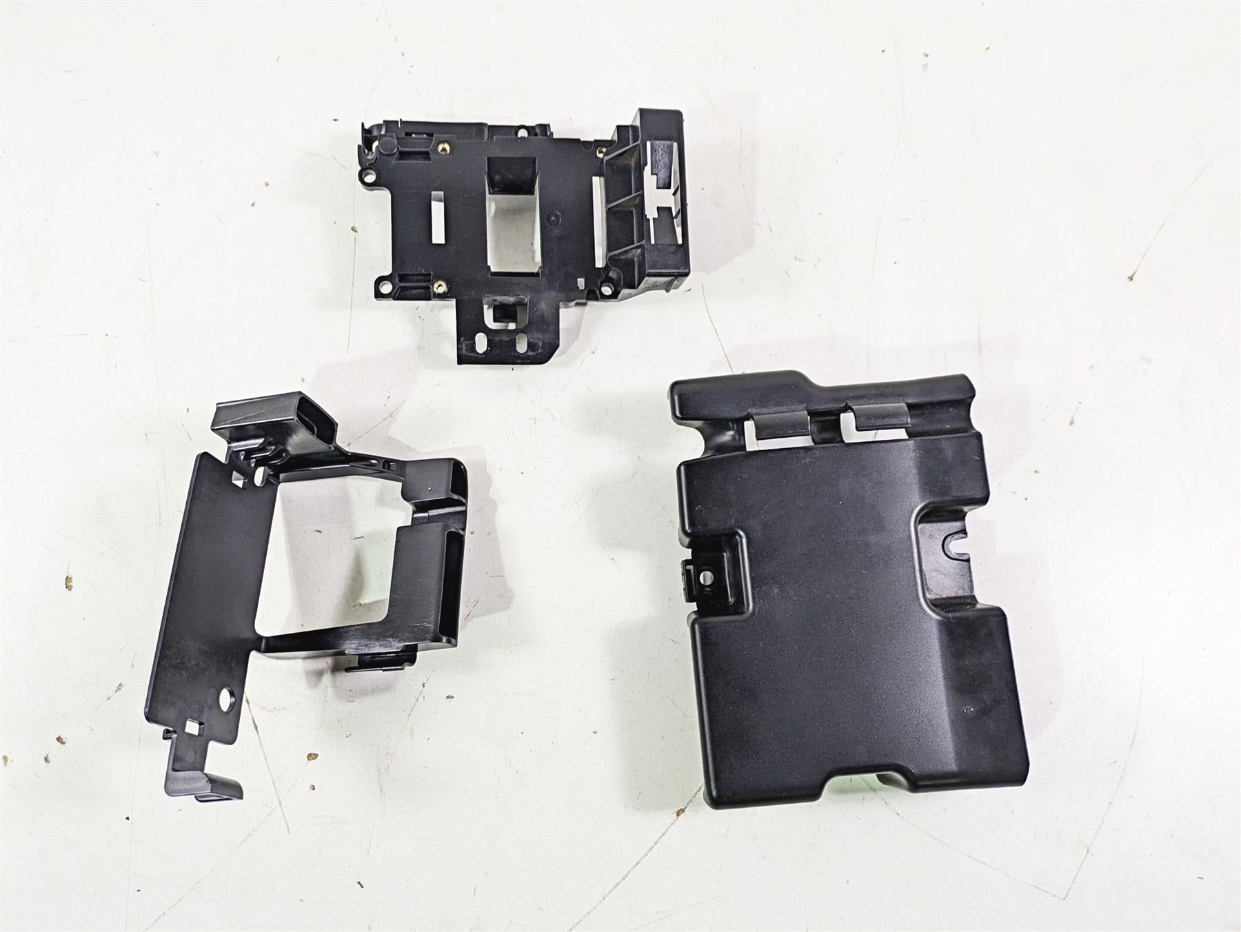 2009 Harley FXCWC Softail Rocker Electrical Carrier Holder Stay Set 70387-08 {{ shop.shopifyCountryName }} - Mototech271