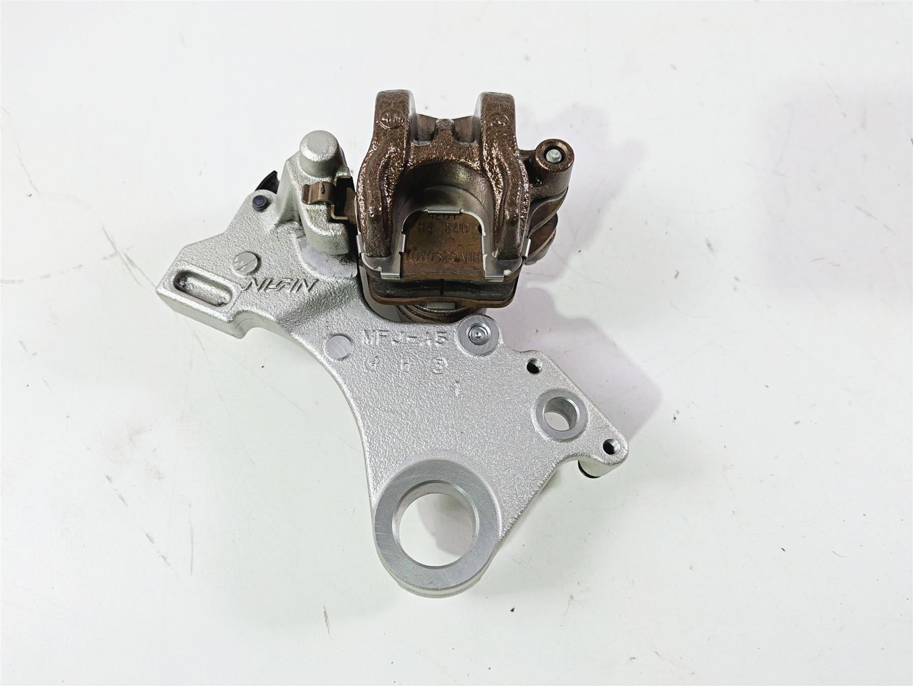 2025 Honda CBR600RR Nissin Rear Brake Caliper & Mount 43150-MFJ-A51 {{ shop.shopifyCountryName }} - Mototech271