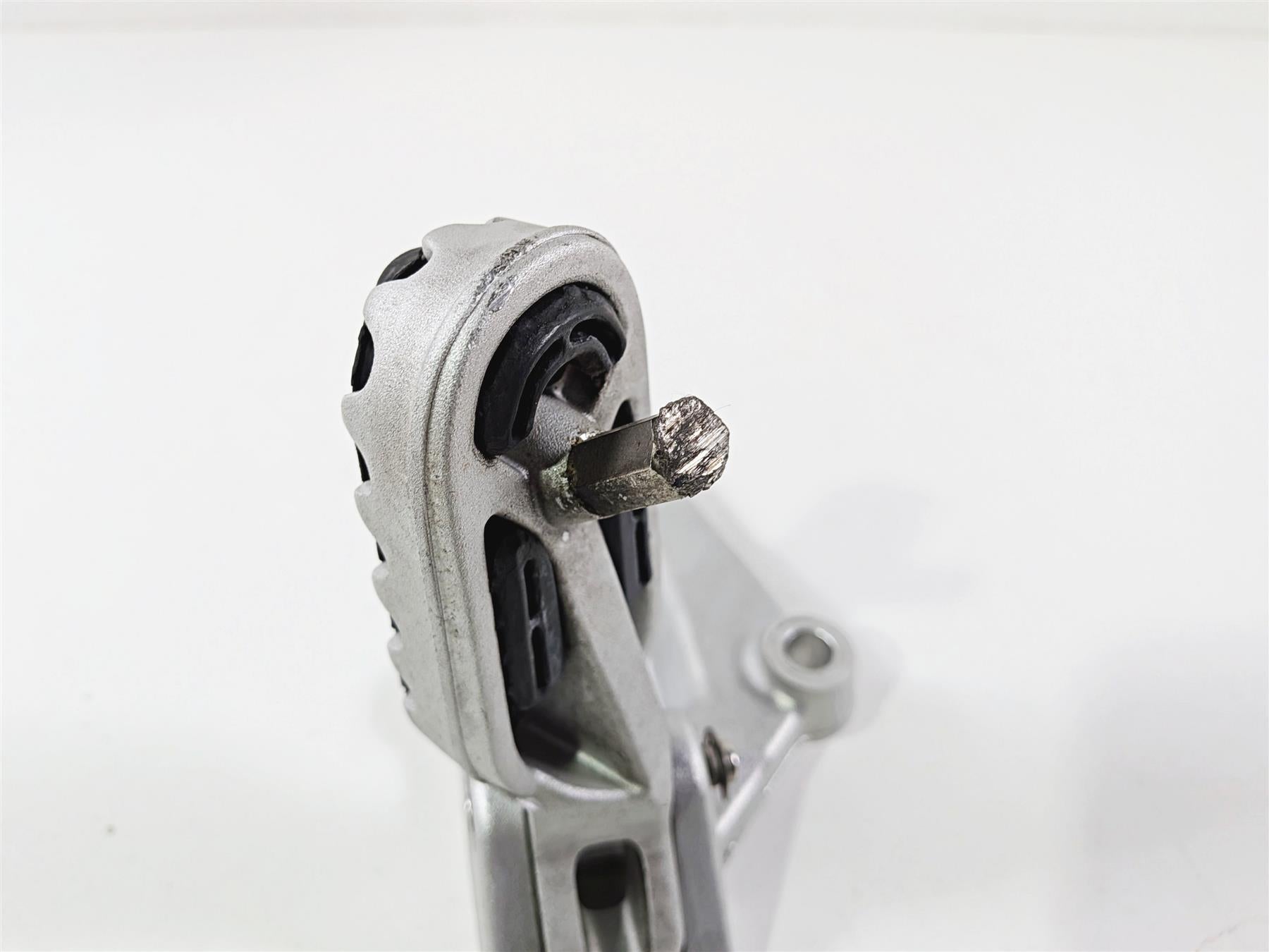 2022 Triumph Tiger 900 GT Pro Left Front Foot Peg & Mount T2082204 {{ shop.shopifyCountryName }} - Mototech271