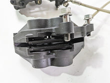 Load image into Gallery viewer, 2006 Triumph Rocket 3 Front Brake Caliper Set &amp; Lines T2020837 T2020388 | Mototech271
