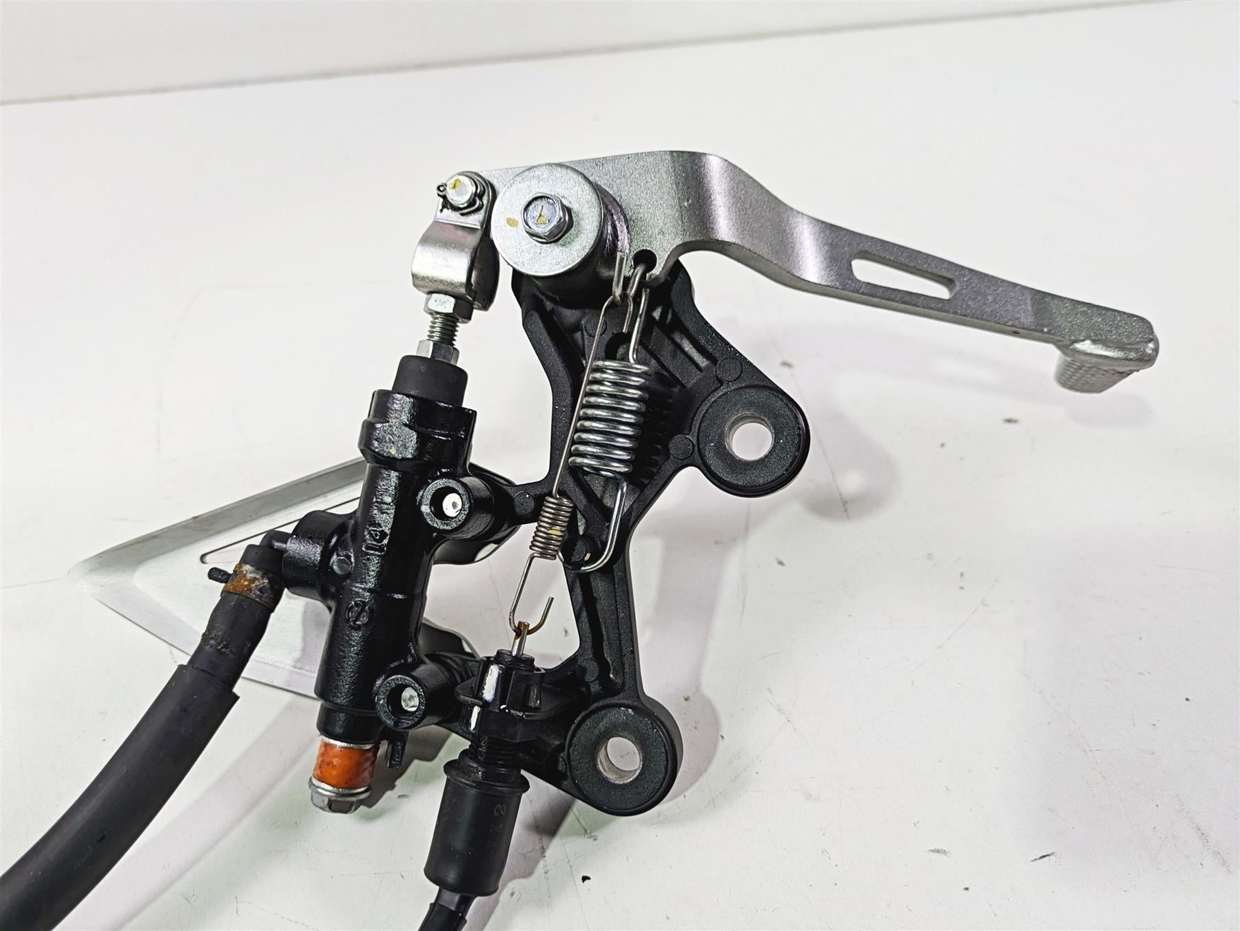 2023 Kawasaki EX400 Ninja Right Footpeg + Brake Lever Master Cylinder 35063-1408 {{ shop.shopifyCountryName }} - Mototech271
