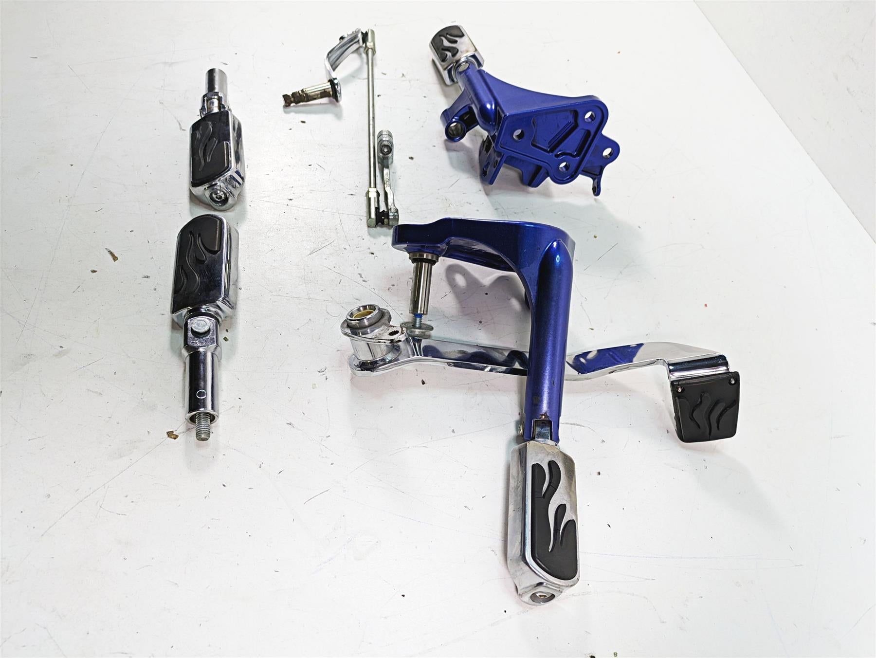 2009 Harley FXCWC Softail Rocker C Flame Foot Peg & Blue Brackets Set 33683-07A {{ shop.shopifyCountryName }} - Mototech271