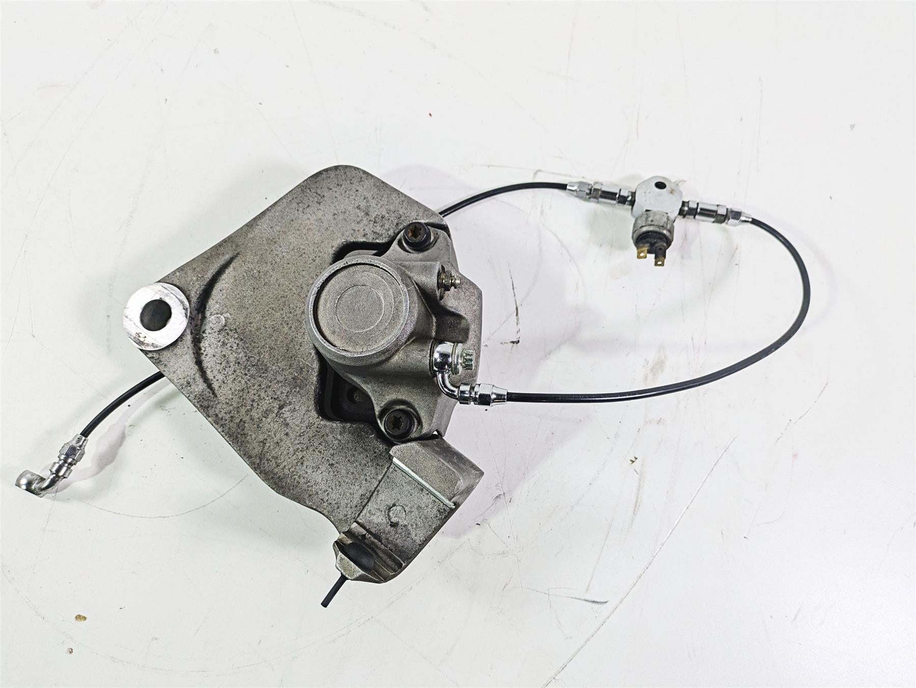 1996 Harley Touring FLHTCUI Electra Glide Rear Brake Caliper & Bracket 54540-93 {{ shop.shopifyCountryName }} - Mototech271