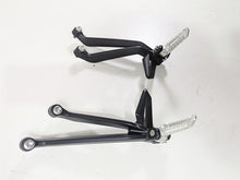 Load image into Gallery viewer, 2024 Triumph Street Triple 765 R Rear Passenger Footpeg Set T2088156 T2088157
