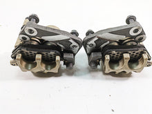 Load image into Gallery viewer, 2012 Triumph Tiger 800XC ABS Nissin Front Brake Caliper Set T2022030 T2022031

