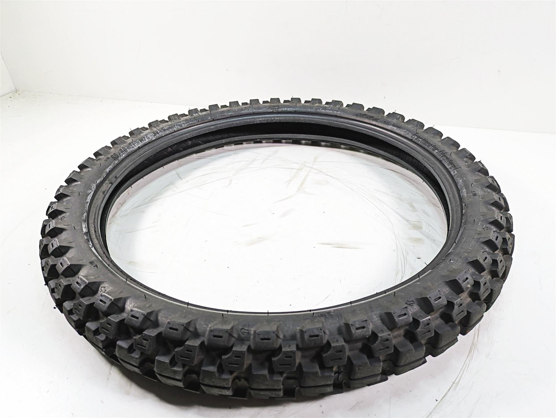 Used Front Motoz Tractionator Adventure 1 Motorcycle Tire 90/90-21 - Read