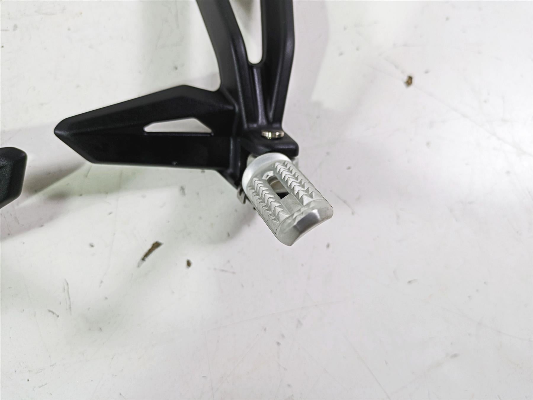 2023 Triumph Street Triple 765 RS Rear Passenger Footpeg Set T2088156 T2088157 {{ shop.shopifyCountryName }} - Mototech271