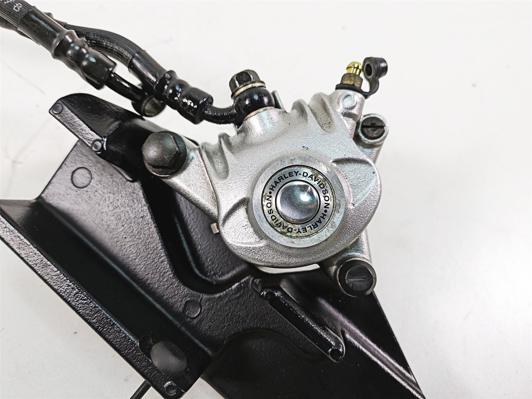 2006 Harley Sportster XL1200 Rear Brake Caliper + Bracket & Line 40968-05A {{ shop.shopifyCountryName }} - Mototech271