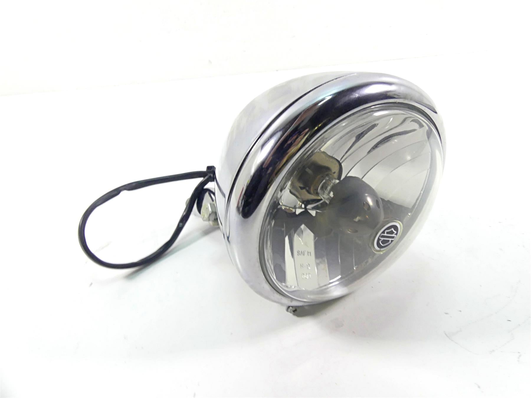 2005 Harley Sportster XL1200 C Headlight Head Light Lamp & Mount 69670-04A {{ shop.shopifyCountryName }} - Mototech271