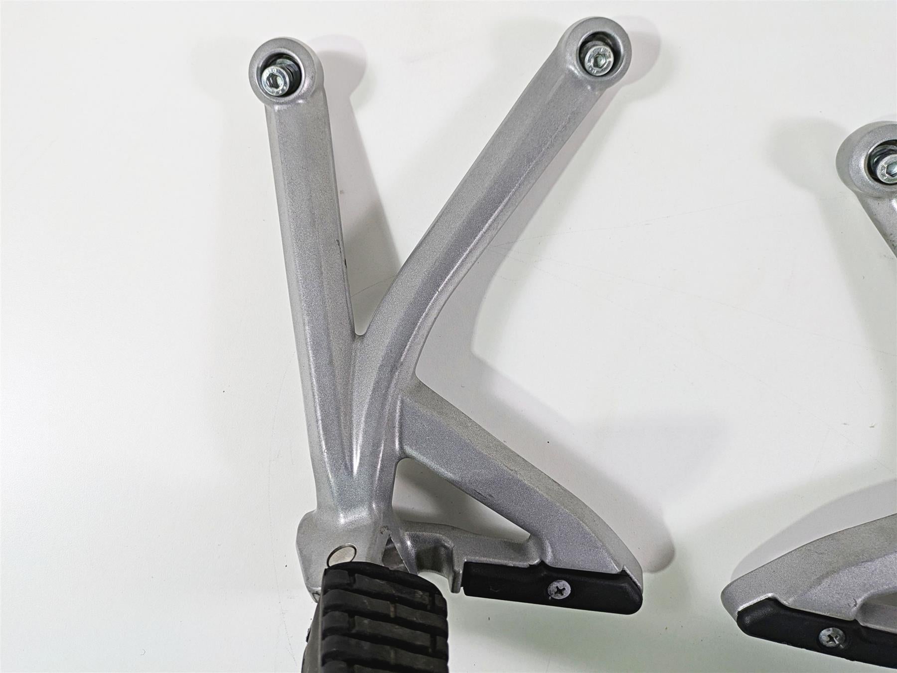 2015 Triumph Tiger Explorer XC Rear Passenger Footpeg Rest Set T2082161 T2082162 {{ shop.shopifyCountryName }} - Mototech271