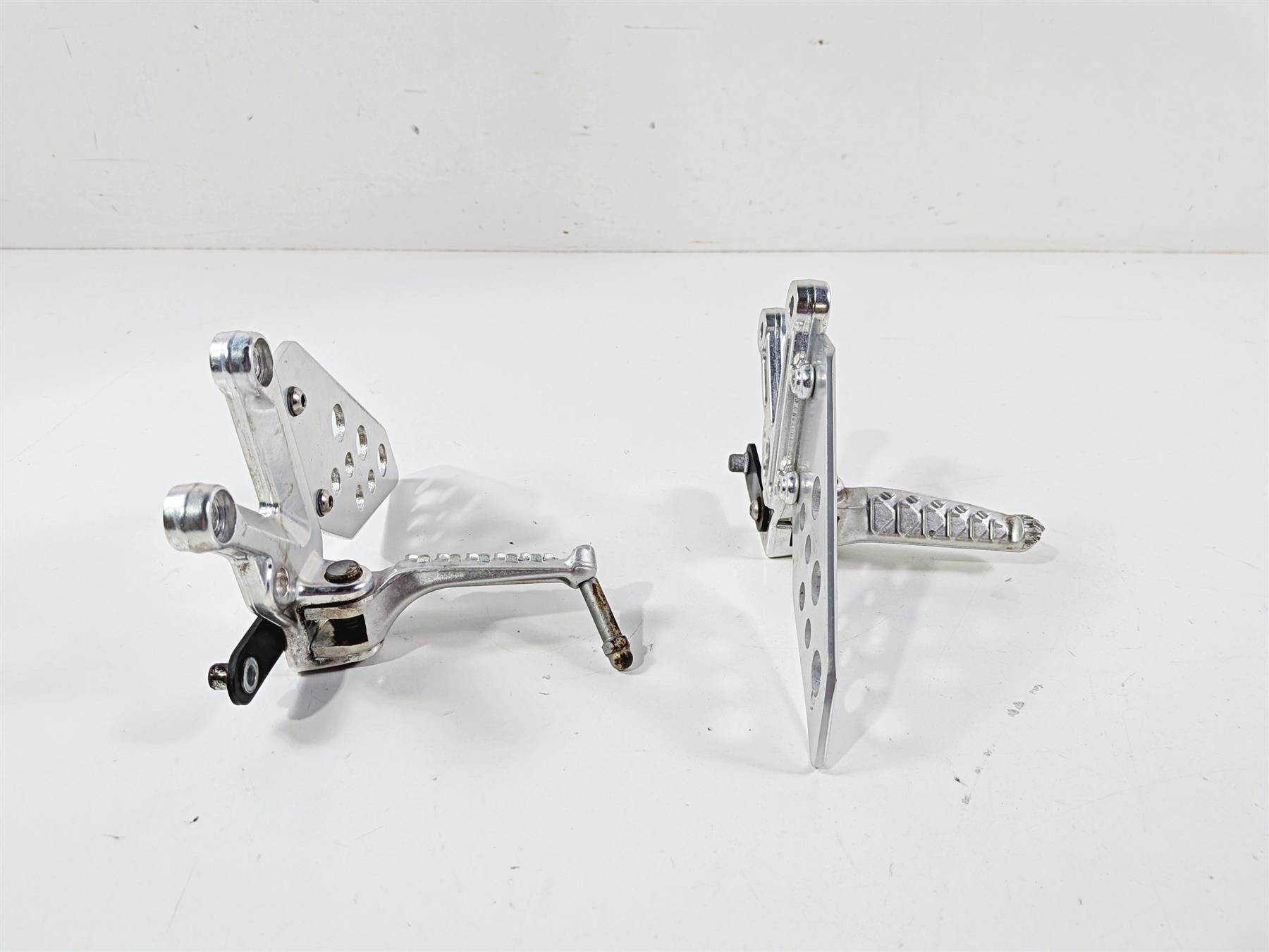2008 Aprilia RSVR 1000 Factory Front Left & Right Foot Pegs AP8154069 AP8154070 {{ shop.shopifyCountryName }} - Mototech271