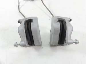 2007 Harley Touring FLHR SE CVO Road King Front Brake Caliper Set 44381-99C
