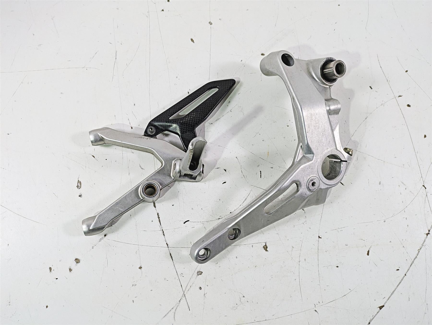 2015 Ducati Panigale 1299 S Left Footpeg & Frame Holder 8291E061AA 82424631AA {{ shop.shopifyCountryName }} - Mototech271