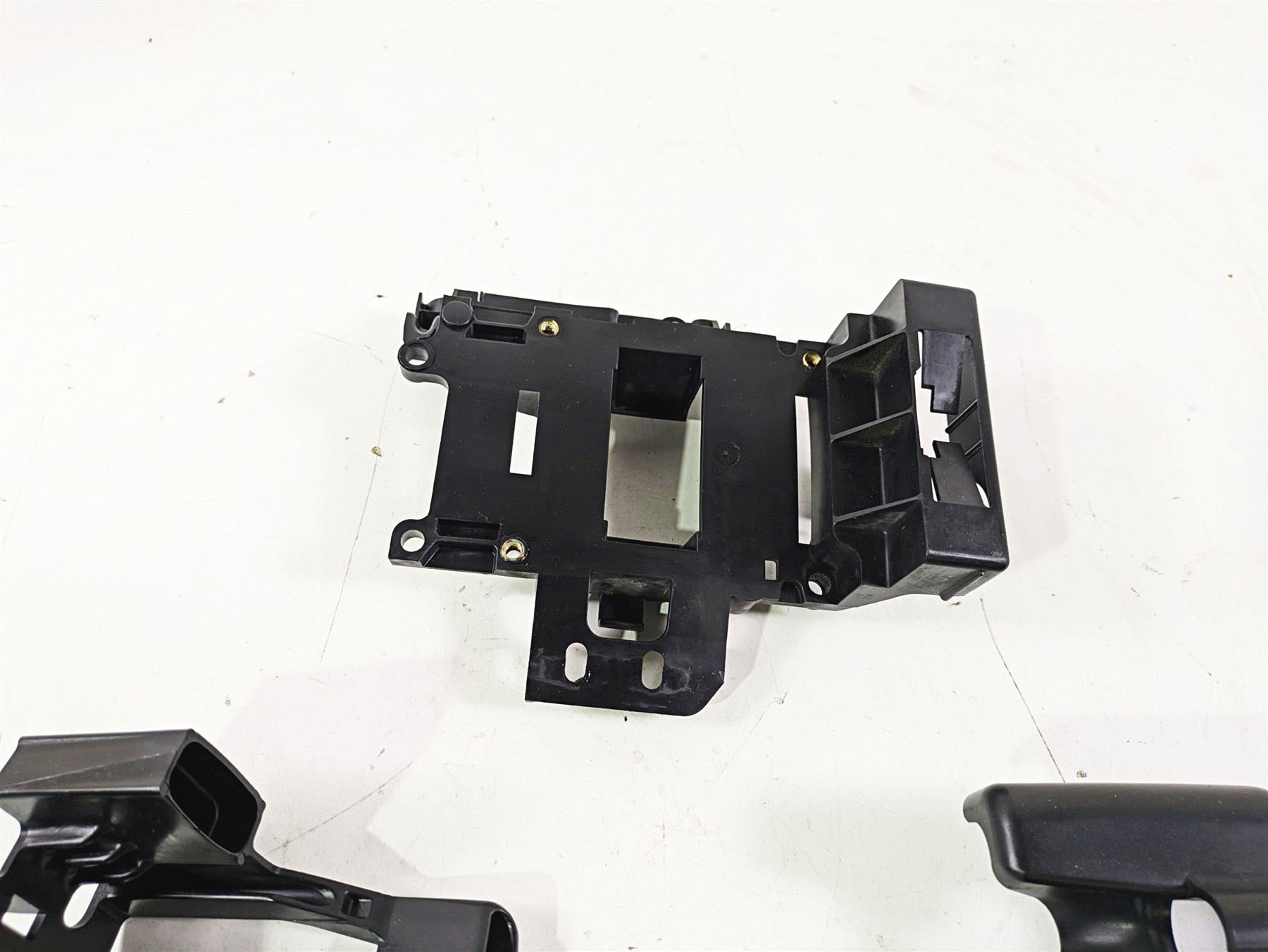 2009 Harley FXCWC Softail Rocker Electrical Carrier Holder Stay Set 70387-08 {{ shop.shopifyCountryName }} - Mototech271