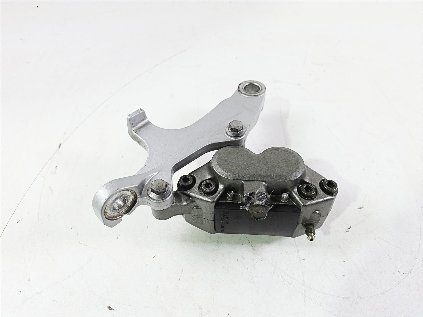 2004 Yamaha XVZ1300 Royal Star Rear Brake Caliper & Bracket 4NK-2580W-01-00 {{ shop.shopifyCountryName }} - Mototech271