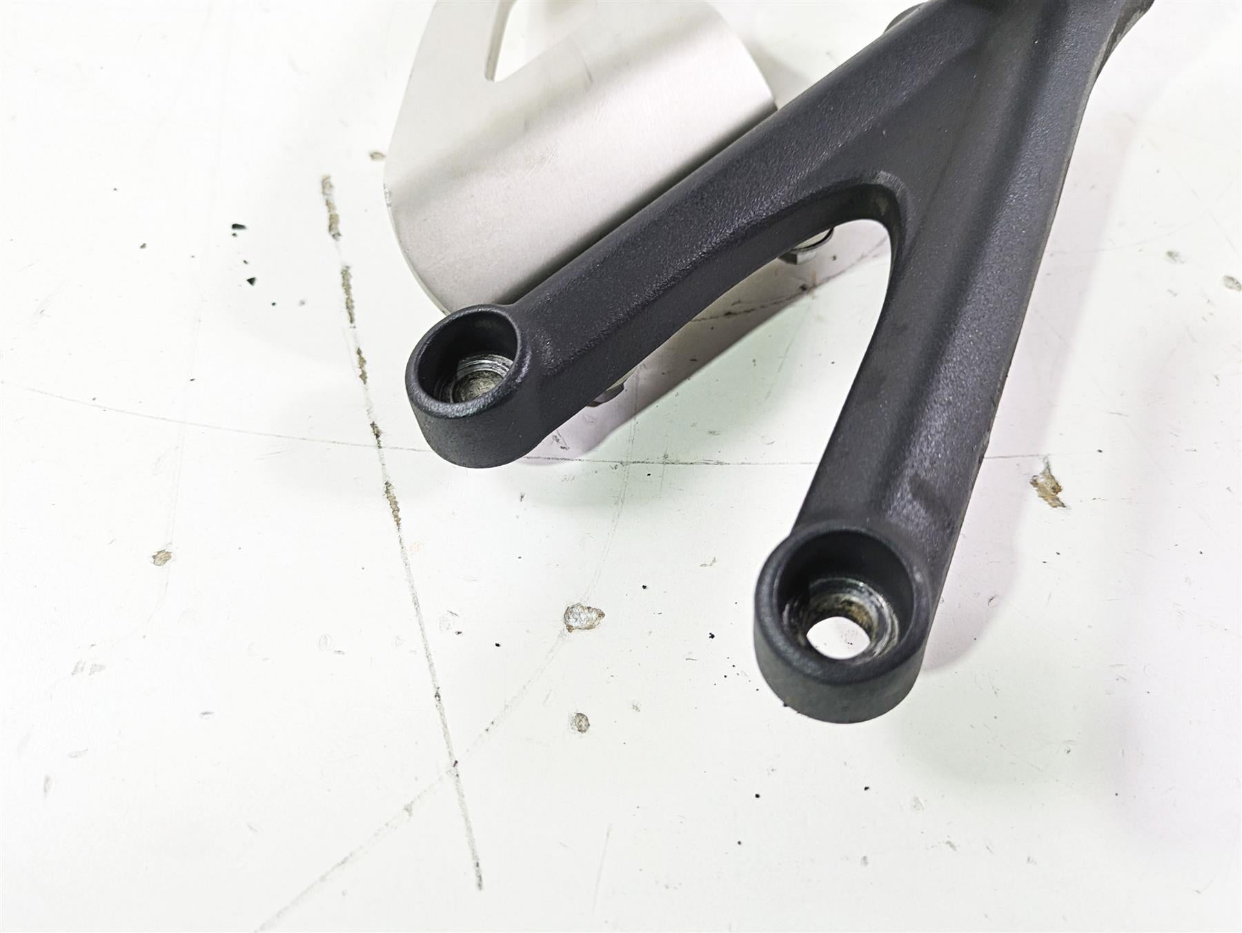 2012 Triumph Daytona 675 Left Rider Footpeg Mount + Shifter Parts T2082066 {{ shop.shopifyCountryName }} - Mototech271