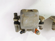Load image into Gallery viewer, 2011 Can-Am Outlander 650 4X4 XT Front Brake Caliper Set 705600576 705600575
