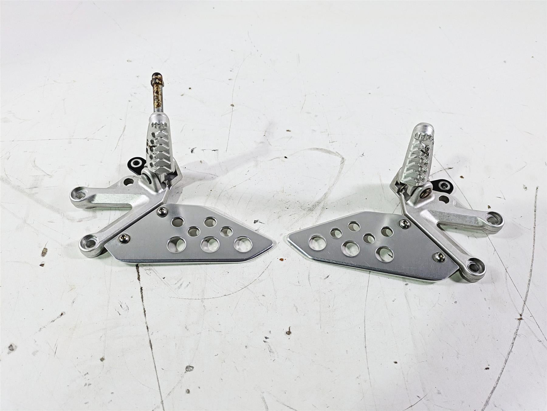 2008 Aprilia RSVR 1000 Factory Front Left Right Foot Peg Set AP8154069 AP8154070 {{ shop.shopifyCountryName }} - Mototech271