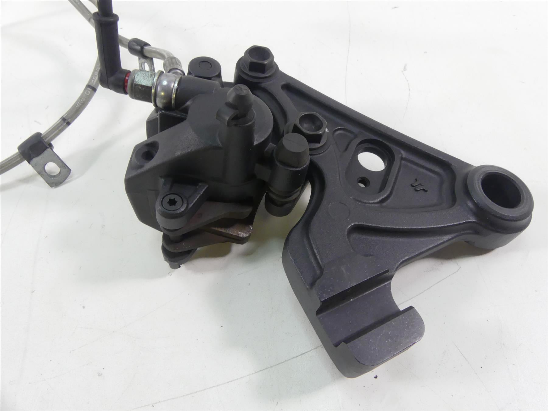 2017 Victory Octane 1200 Rear Brake Caliper + Line & Mount 1912701-468 {{ shop.shopifyCountryName }} - Mototech271