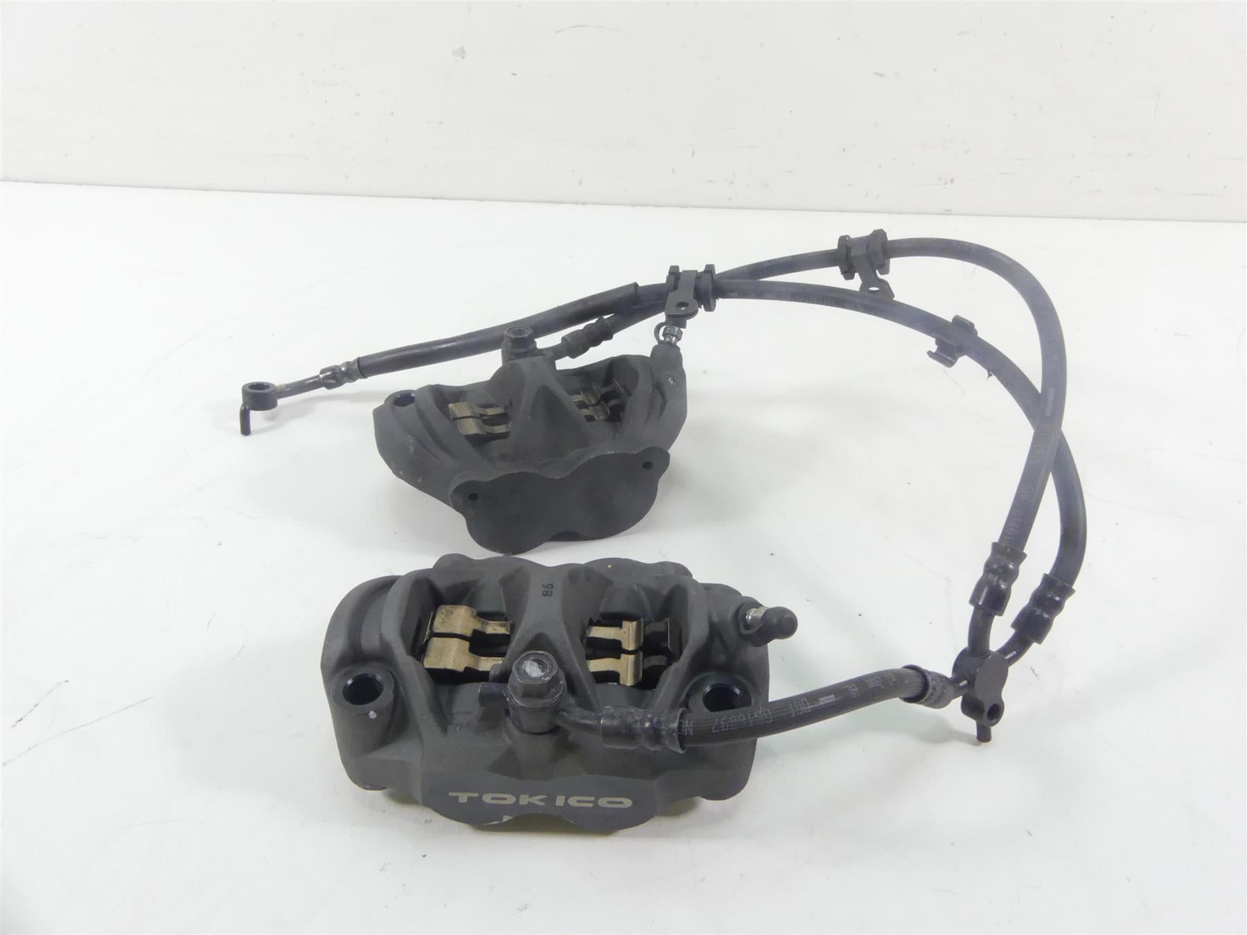 2018 Honda CBR1000 RR SC77 Tokico Front Brake Caliper + Lines Set 45150-MJM-D31 | Mototech271