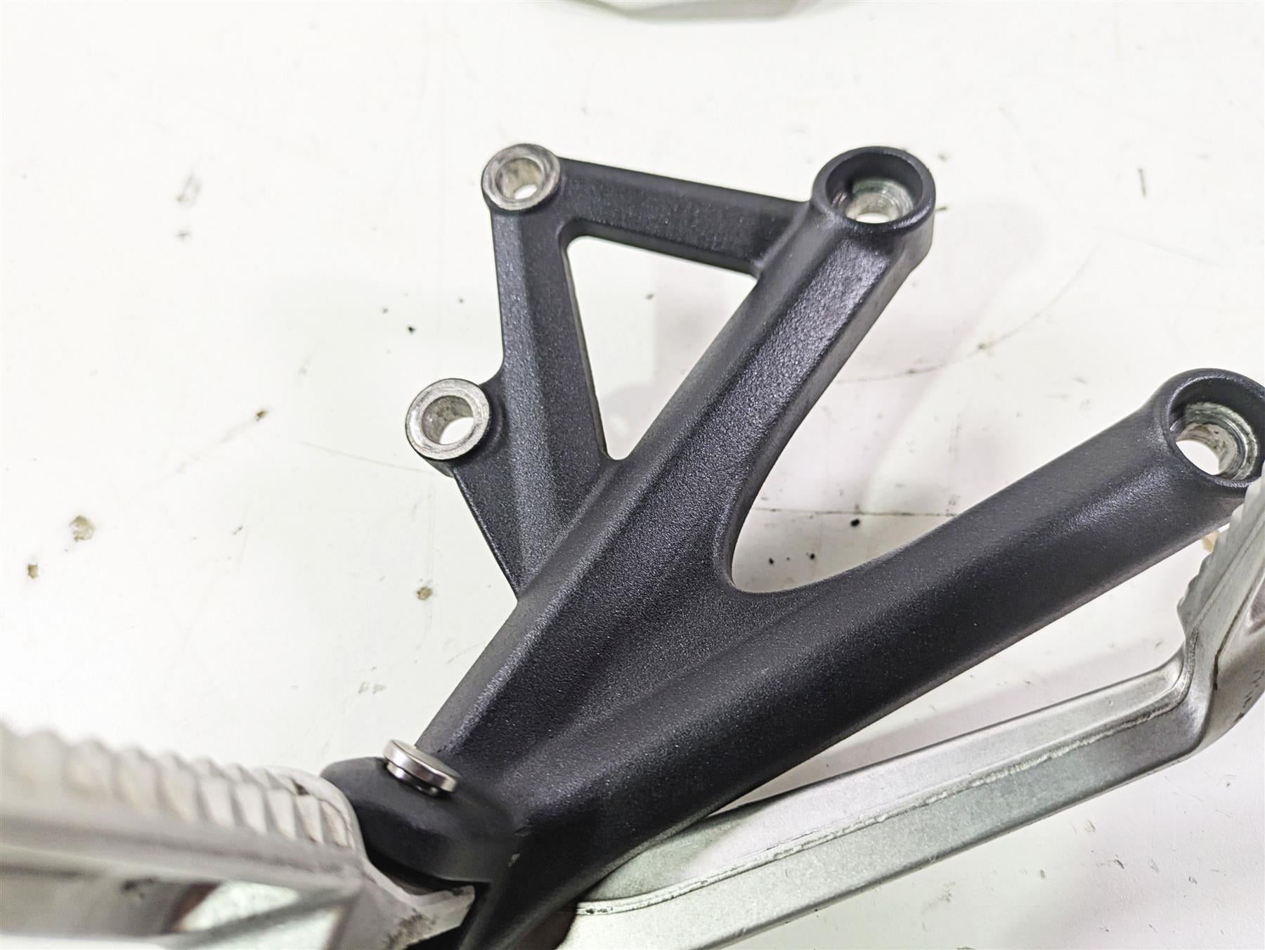 2012 Triumph Daytona 675 Right Rider Footpeg & Brake Pedal Set T2082056 T2082056 {{ shop.shopifyCountryName }} - Mototech271