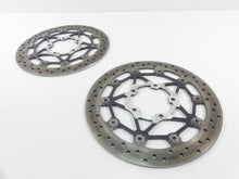 Load image into Gallery viewer, 2013 Triumph Street Triple 675R Front Brake Rotor Disc Set 4K T2021440�
