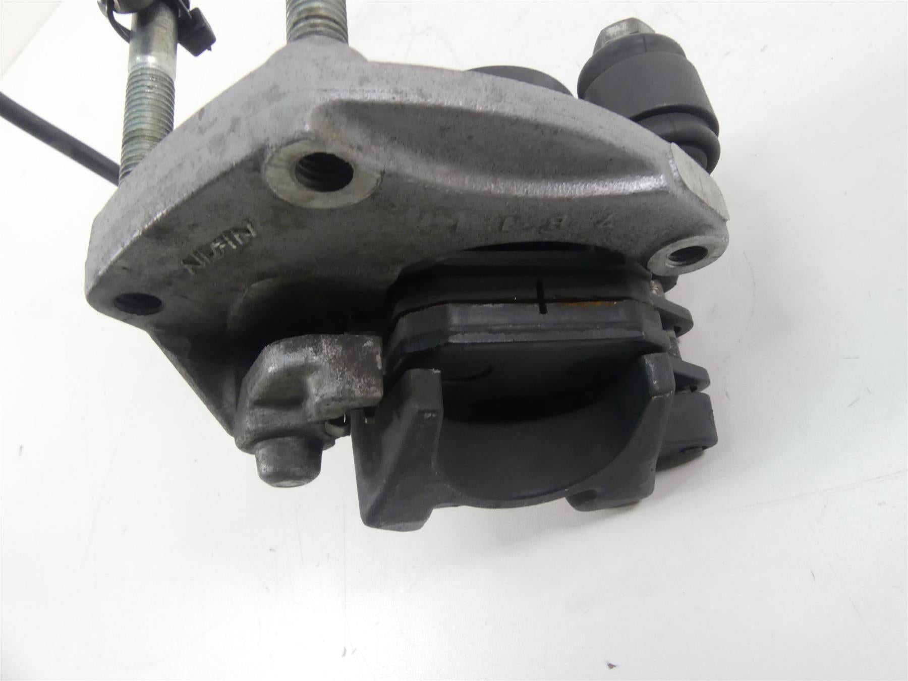 2007 Buell XB12 SS Lightning Rear Nissin Brake Caliper & Bracket H0102.02A8A {{ shop.shopifyCountryName }} - Mototech271