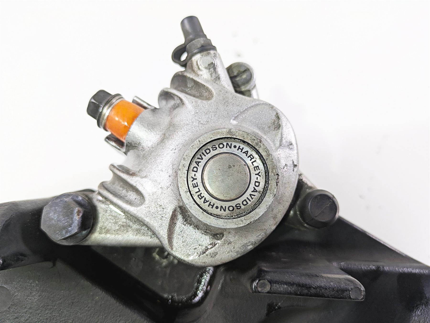 2007 Harley Sportster XL1200 C Rear Brake Caliper & Mount 42029-07 {{ shop.shopifyCountryName }} - Mototech271