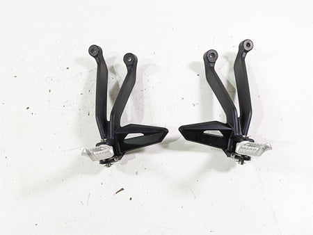 2023 Triumph Street Triple 765 RS Rear Passenger Footpeg Set T2088156 T2088157 {{ shop.shopifyCountryName }} - Mototech271