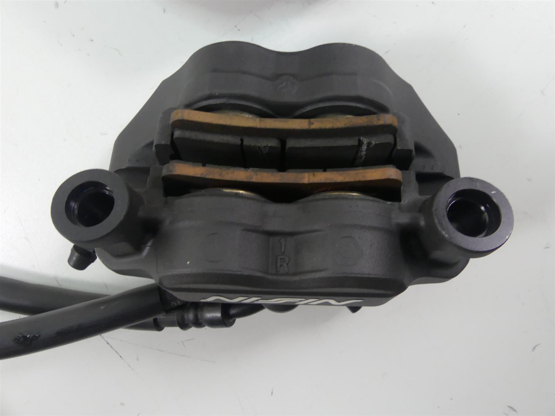 2013 Kawasaki ZX636 ZX6R Ninja Nissin Front Brake Caliper Set 43080-0111-DJ {{ shop.shopifyCountryName }} - Mototech271