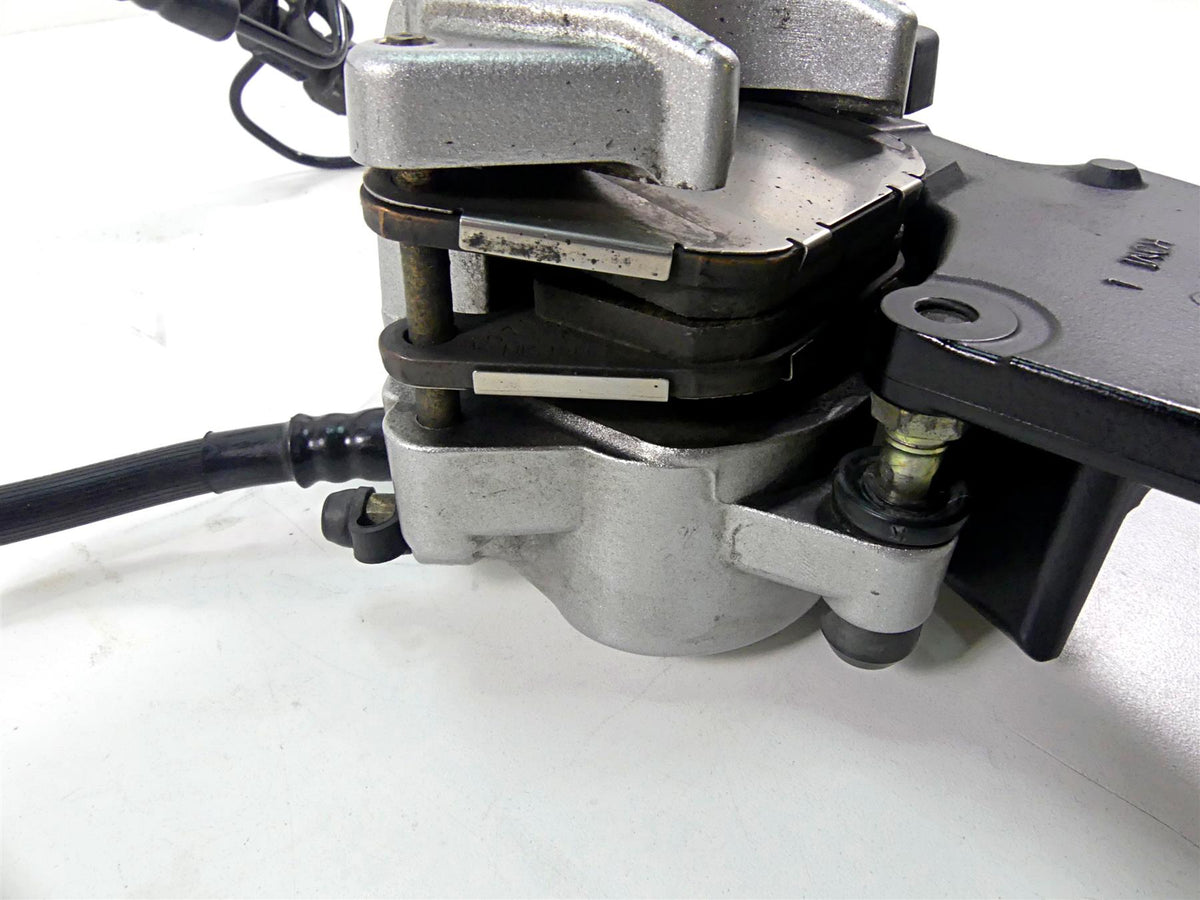 2005 Harley Sportster XL1200 C Rear Brake Caliper & Bracket 40968-05A {{ shop.shopifyCountryName }} - Mototech271