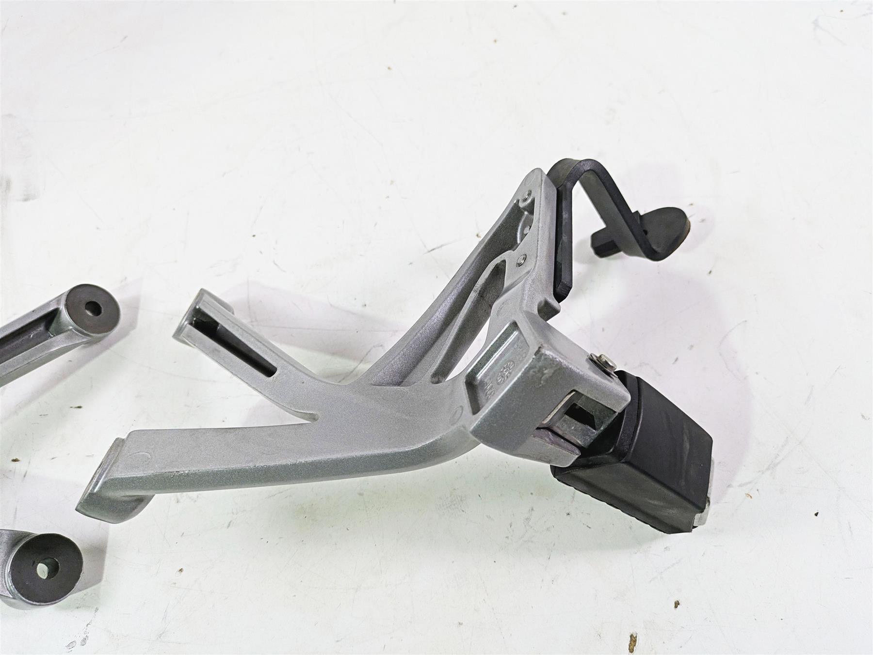 2013 Triumph Tiger 1215 Explorer Rear Passenger Footpeg Rest Set T2082162 {{ shop.shopifyCountryName }} - Mototech271
