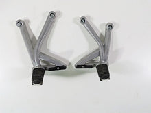 Load image into Gallery viewer, 2015 Triumph Tiger Explorer XC Rear Passenger Footpeg Rest Set T2082161 T2082162 | Mototech271

