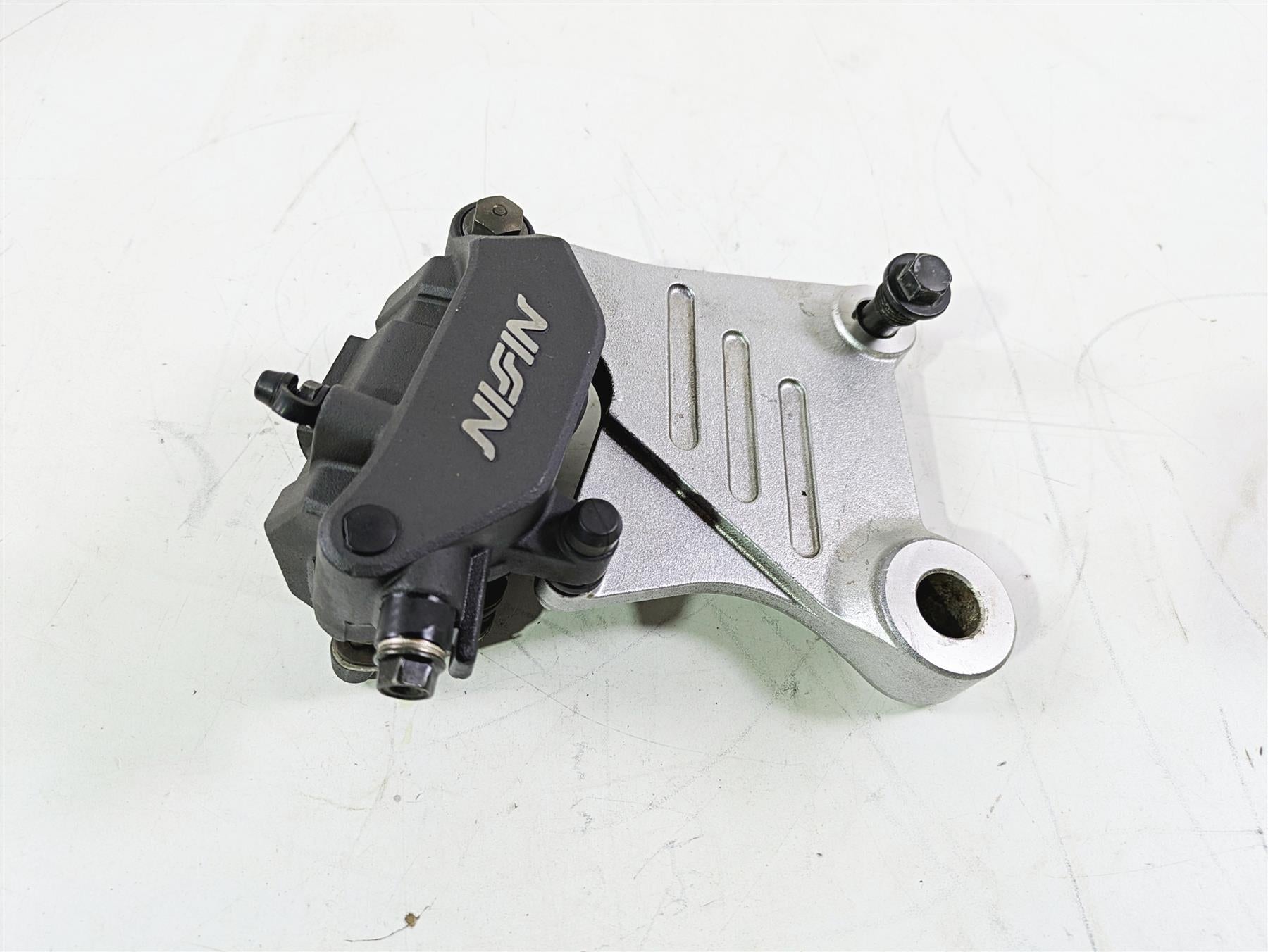 2002 Honda V-Twin VTX1800 C Rear Brake Caliper & Bracket Nissin 43150-MCH-006 {{ shop.shopifyCountryName }} - Mototech271